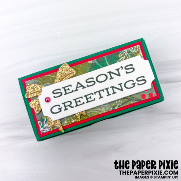 This is a Chocolate & Chapstick Gift Box featuring the Boughs of Holly Stampin’ Up! Suite Collection and sized to fit Hershey’s Nuggets and a mini Chap-Ice® and the sentiment says Season's Greetings